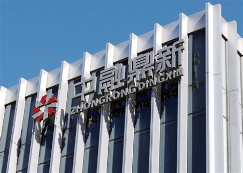 Beijing police investigate major Chinese shadow bank Zhongzhi after it says it’s insolvent